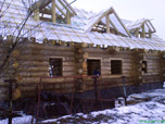 Portfolio/Log house in a field
