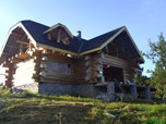 Portfolio/Log house in a field